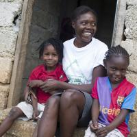 Image of a health worker with children