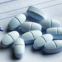 Hydrocodone with Acetaminophen Tablets on a Prescription Form